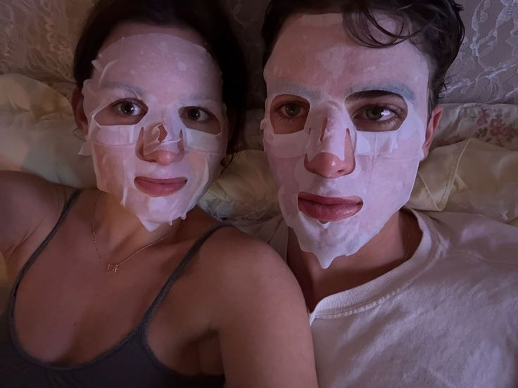 A couple having a relaxed face-mask night